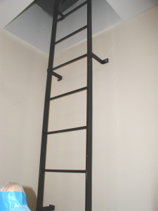 Steel roof ladder interior. (Queens, NY)