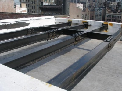 Pocketed steel roof dunnage / floating and painted. (Long Island, NY)