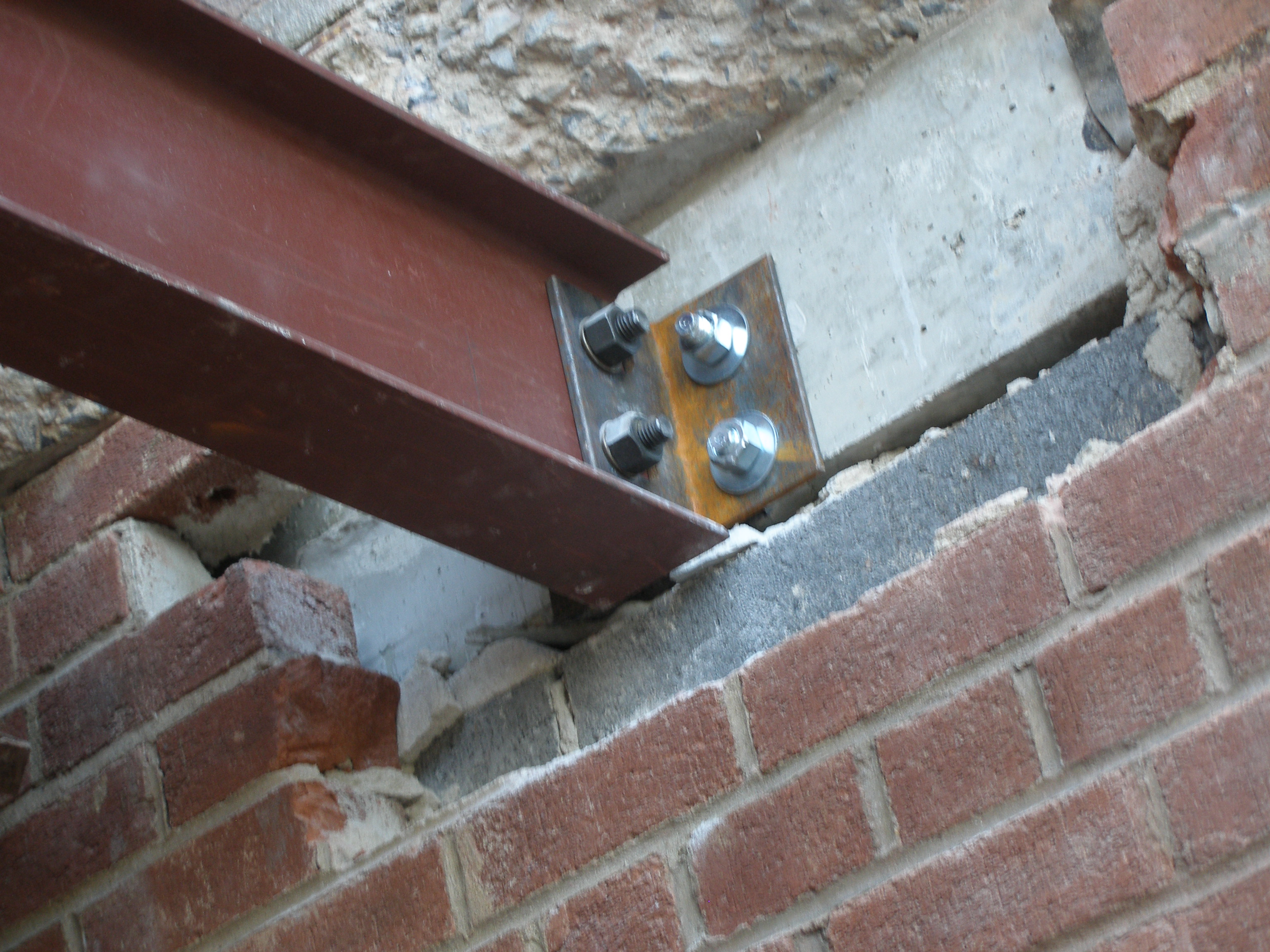 Structural steel threaded rod epoxied mechanical attachment to masonry ...