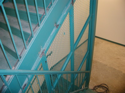 Welded wire mesh steel staircase dividers. (Bronx, NY)