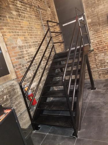 diamond plate iron stair piperail