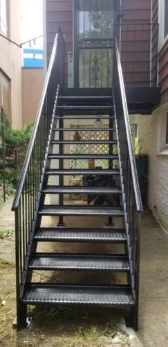 exterior metal stairs open tread diamond plate fully welded steel steps solid railings.
