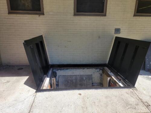 Steel sidewalk vault door cellar harlem