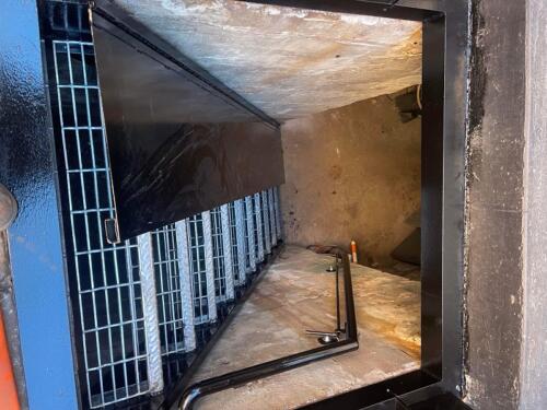 storefront basement egress-galvanized grating metal stairs-hinged steel plate folding loading ramp egress